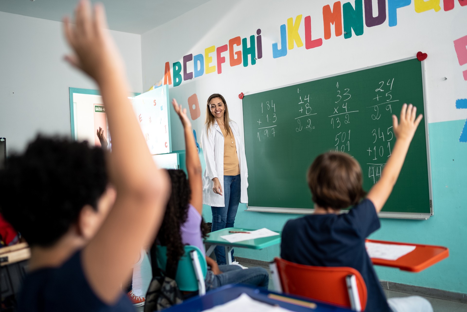 Teacher teaching students in the classroom